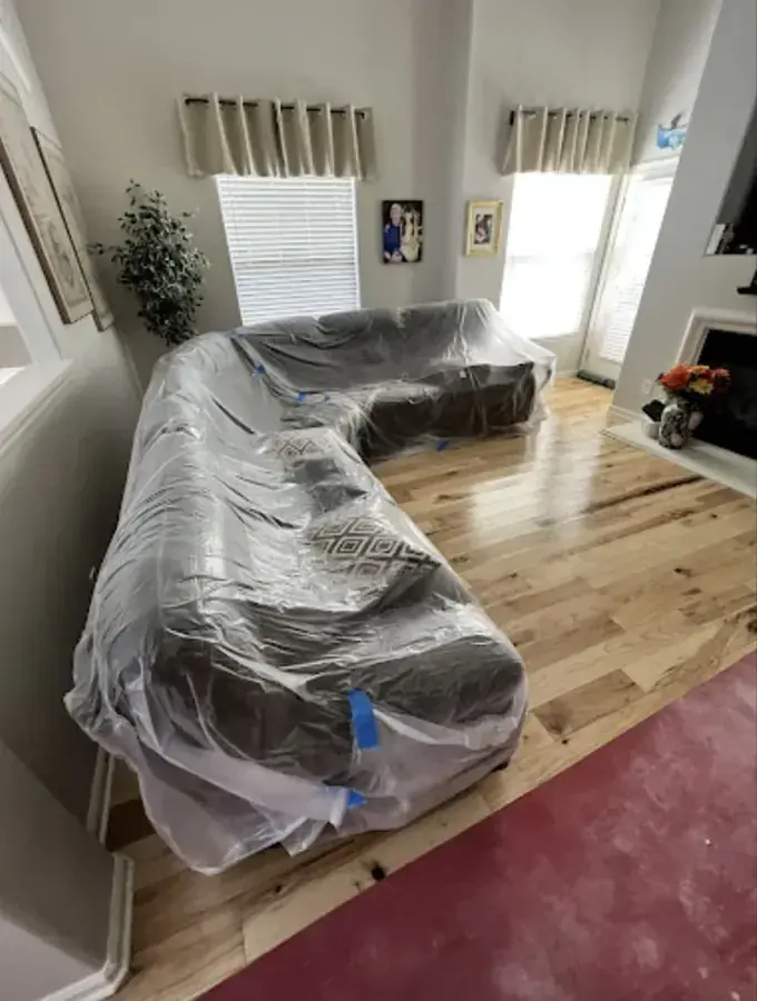 Water spreading from a burst pipe on a floor in an Inglewood, CA home