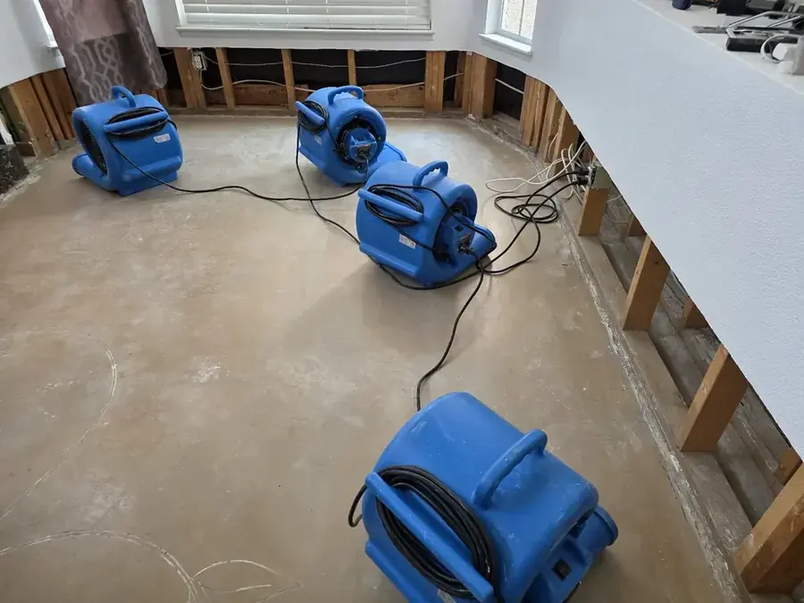 Air movers and dehumidifiers drying an Inglewood, CA room