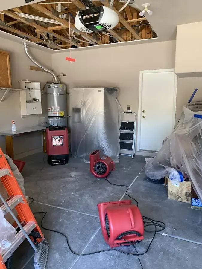 Water heater flood in an Inglewood, CA garage